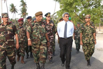 பலத்த பாதுகாப்புடன் கோடீஸ்வர வர்த்தகருக்கு இறுதி அஞ்சலி செலுத்திய கோட்டாபய