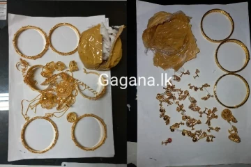 රන් භාණ්ඩ තොගයක් සමඟ දෙදෙනෙක් කොටු කර ගනී.(PHOTOS)