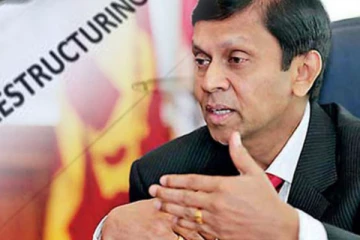 ණය ප්‍රතිව්‍යුහගත කිරීමේ යෝජනා වෙනස් කිරීමට සිදුවිය හැකි බව හිටපු මහබැංකු අධිපතිවරයෙක් කියයි