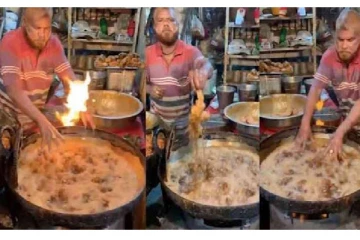 கொதிக்கும் எண்ணெயில் அசால்டாக கைவிட்டு சிக்கன் பொரிக்கும் நபர்: வைரலாகும் வீடியோ