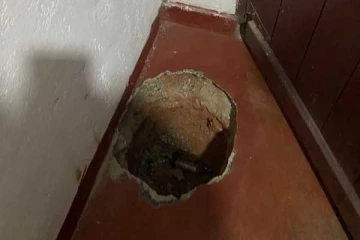 பதுங்கு குழியிலிருந்து மீட்கப்பட்ட இலட்சக்கணக்கான பணம்!