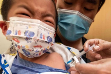 கொரோனா தடுப்பூசி போட்ட குழந்தைகளுக்கு பக்கவிளைவு! அமெரிக்க CDC  முக்கிய தகவல்