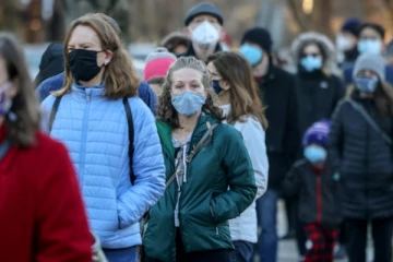 கோவிட் அறிகுறி இல்லாதவர்களுக்கு அமெரிக்காவில் புதிய விதிகள்