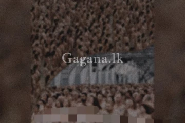 පාලමක් උඩ දහස් ගණනක් නිරුවතින් මොකද මේ..(VIDEO)