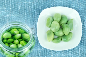 දැක්කම කන්න ආස හිතෙන - චීනයේ ජනප්‍රියම කොළ සුදුළූණු හදන්නේ මෙහෙමයි.