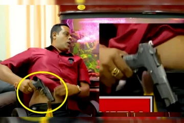 நேர்காணலின் நடுவே துப்பாக்கியை எடுத்துக் காட்டிய மகிந்தவின் சகா (Video)