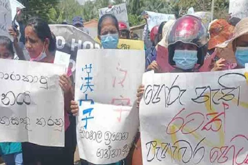 சீன மொழி பதாதைகளுடன் வடக்கில் பாரிய போராட்டம்!!