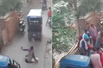 போன் பேசிக்கொண்டே  குழிக்குள் விழுந்த பெண் : வைரலாகும் வீடியோ