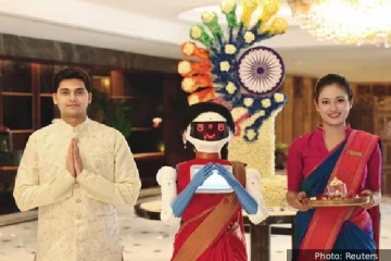 இந்தியா AI இம்பாக்ட் சமிட் 2026: விருந்தினர்களை திரும்பி பார்க்க வைத்த பட்டு புடவை அணிந்த ரோபோ