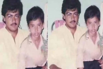 அஜித் மடியில் உட்கார்ந்திருக்கும் இந்த பிரபல நடிகர் யார் தெரியுமா?- அட இவர்தானா?