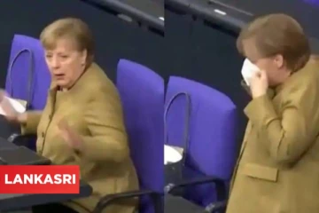 ஜேர்மனி அதிபரை ஒரு நிமிடம் பதற வைத்த முகக்கவசம்! நாடாளுமன்ற அவையில் நடந்த சம்பவத்தின் வீடியோ