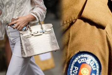 பெண்ணொருவரின் பணப்பையை திருடிய பொலிஸ் அதிகாரி கைது