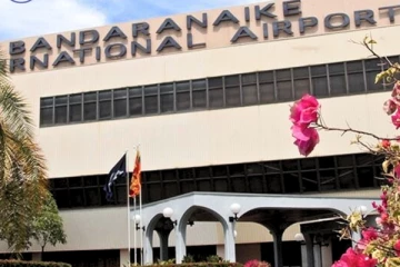 கையடக்கத் தொலைபேசிகளுடன் வர்த்தகர் கைது