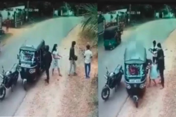 තරුණ යුවලකට මහ මඟදී තරුණයින් දෙදෙනෙක් පහර දෙන වීඩියෝව මෙන්න.(CCTV VIDEO)